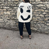 Uvoľnený smiley sveter