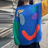 Uvoľnený smiley sveter
