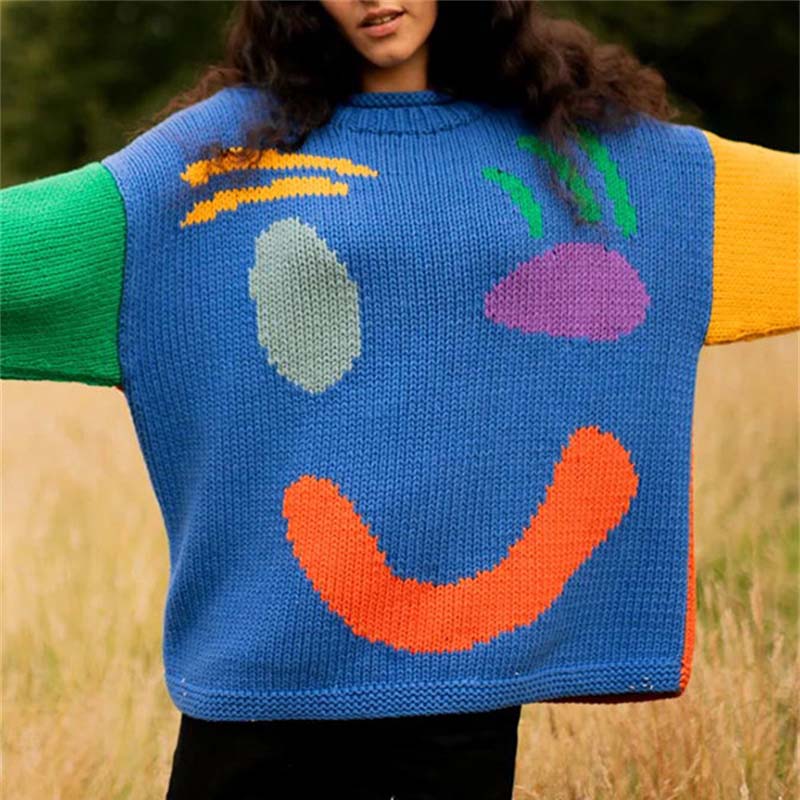 Uvoľnený smiley sveter